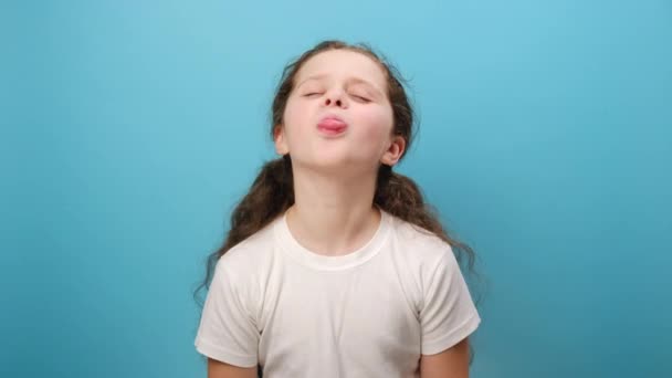 Portrait Funny Playful Adorable Preteen Girl Child Showing Tongue Out — Stock Video