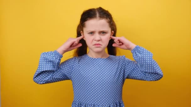 Portrait Irritated Stressed Little Girl Child Blue Dress Cover Ears — Stock Video