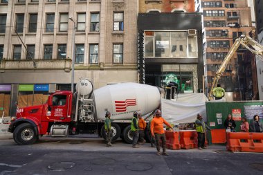 NEW YORK - NOVEMBER 3, 2022: Construction workers in midtown Manhattan clipart