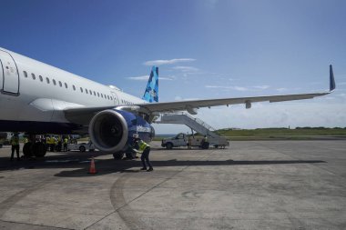 ST. GEORGE, GRENADA - JANUARY 3, 2023: JetBlue plane on tarmac at Maurice Bishop International Airport in Grenada