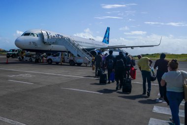 ST. GEORGE, GRENADA - JANUARY 3, 2023: JetBlue plane on tarmac at Maurice Bishop International Airport in Grenada