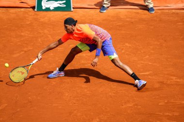 PARIS, FRANCE - MAY 30, 2015: Professional tennis player Nick Kyrgios of Australia in action during his third round match at Roland Garros 2015 in Paris, France