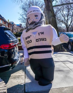 BrooKLYN, New York - 7 Mart 2023: Yahudi cemaati Brooklyn, New York 'ta Purim' i kutluyor. Purim, Yahudileri yok olmaktan kurtaran bir Yahudi bayramıdır. 
