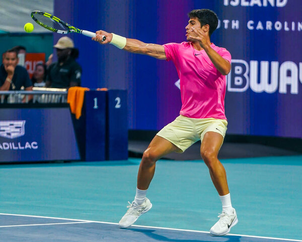 MIAMI GARDENS, FLORIDA - MARCH 29, 2023: Carlos Alcaraz of Spain in action during quarter-final match against Taylor Fritz of United States at 2023 Miami Open at the Hard Rock Stadium in Miami Gardens, Florida, USA