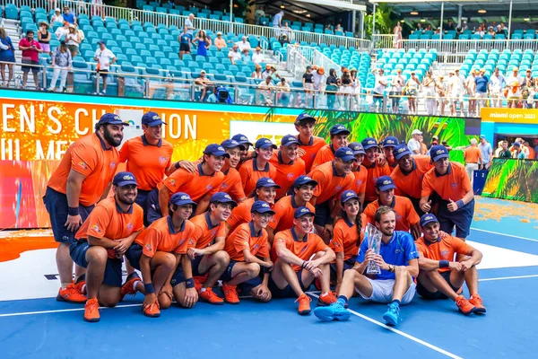 Stock image MIAMI GARDENS, FLORIDA - APRIL 2, 2023: Daniil Medvedev of Russia poses with ball boys after defeating Jannik Sinner of Italy in the men's singles final match at 2023 Miami Open at the Hard Rock Stadium, Miami Gardens, Florida, USA