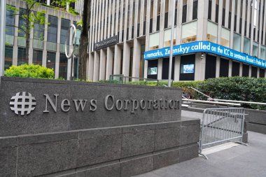 NEW YORK - MAY 4 , 2023: Fox News Channel at the News Corporation headquarters building in New York City. Fox Corporation is a publicly traded American multinational mass media company operated and controlled by media mogul Rupert Murdoch clipart