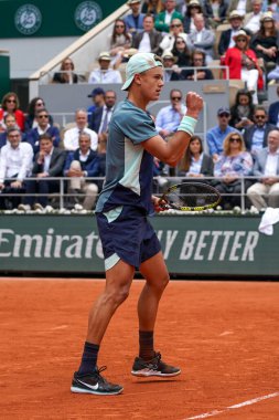 PARIS, FRANCE - MAY 30, 2022: Professional tennis player Holger Rune of Denmark in action during his round 4 match against Stefanos Tsitsipas of Greece at 2022 Roland Garros in Paris, France