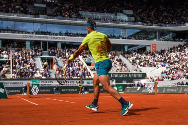 PARIS, FRANCE - MAY 29, 2022: Grand Slam champion Rafael Nadal of Spain in action during his round 4 match against Felix Auger Aliassime of Canada at 2022 Roland Garros in Paris, France