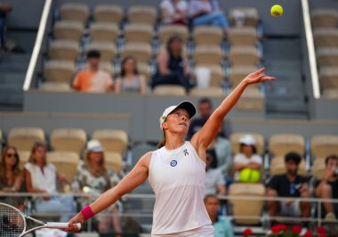 PARIS, FRANCE - JUNE 8, 2023: Professional tennis player Iga Swiatek of Poland in action during women singles semi-final match against Beatriz Haddad Maia of Brazil at 2023 Roland Garros in Paris, France clipart