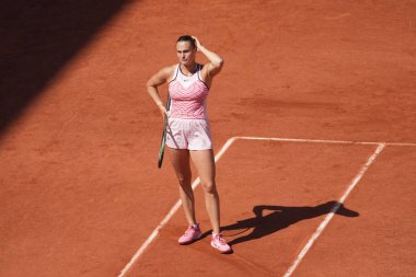 PARIS, FRANCE - MAY 31, 2023: Professional tennis player Aryna Sabalenka of Belarus in action during women singles second round match against Iryna Shymanovich of Belarus at 2023 Roland Garros in Paris, France clipart