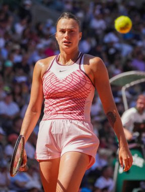 PARIS, FRANCE - MAY 31, 2023: Professional tennis player Aryna Sabalenka of Belarus in action during women singles second round match against Iryna Shymanovich of Belarus at 2023 Roland Garros in Paris, France clipart