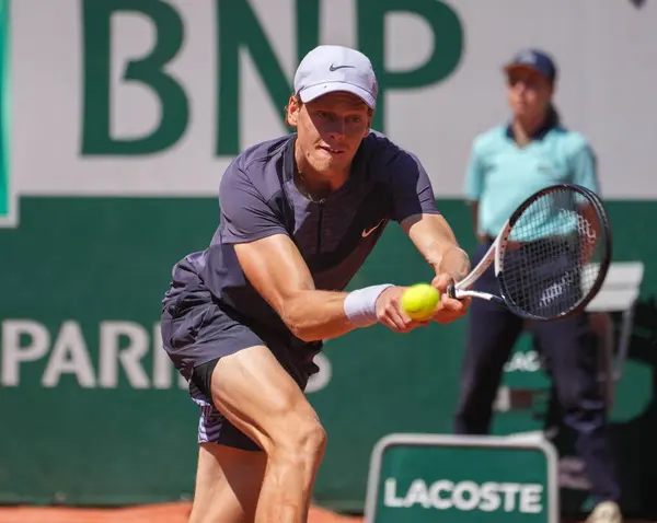 stock image PARIS, FRANCE - JUNE 1, 2023: Professional tennis player Jannik Sinner of Italy in action during his second round match against Daniel Altmaier of Germany at 2023 Roland Garros in Paris, France