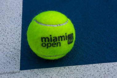 MIAMI GARDENS, FLORIDA - MARCH 31, 2023: Miami Open Official tennis ball at the Hard Rock Stadium in Miami Gardens, Florida. Dunlop tennis ball is an official ball of the Miami Open clipart