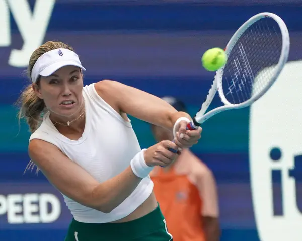 stock image MIAMI GARDENS, FLORIDA - MARCH 30, 2024: 2024 Miami Open Champion Danielle Collins of USA in action during the women's singles final match against Elena Rybakina of Kazakhstan at Hard Rock Stadium in Miami Gardens