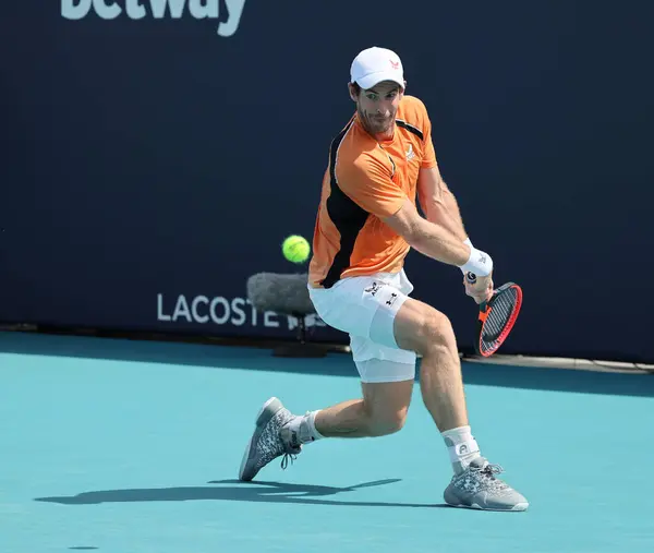 stock image MIAMI GARDENS, FLORIDA - MARCH 24, 2024: Andy Murray of United Kingdom in action during round of 32 match against Tomas Machac of Czech Republic at 2024 Miami Open at the Hard Rock Stadium in Miami Gardens