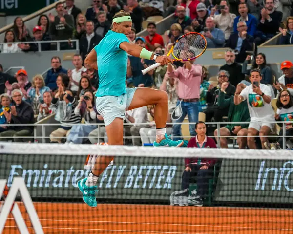 stock image PARIS, FRANCE - MAY 27, 2024: Grand Slam champion Rafael Nadal of Spain in action during his 2024 Roland Garros first round match against Alexander Zverev at Court Philippe Chatrier in Paris, France