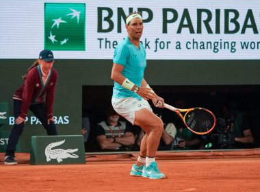 PARIS, FRANCE - MAY 27, 2024: Grand Slam champion Rafael Nadal of Spain in action during his 2024 Roland Garros first round match against Alexander Zverev at Court Philippe Chatrier in Paris, France clipart