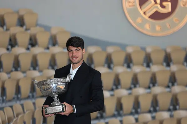 stock image PARIS, FRANCE - JUNE 9, 2024: 2024 Roland Garros champion Carlos Alcaraz of Spain posing with trophy after men's final match victory against Alexander Zverev of Germany at Court Philippe Chatrier in Paris, France