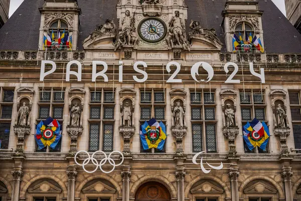 stock image PARIS, FRANCE - MAY 31, 2024: The Olympic Rings are seen in front of the Paris City Hall in Paris, France