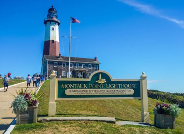 The Montauk Point Lighthouse at the edge of Long Island, New York  clipart