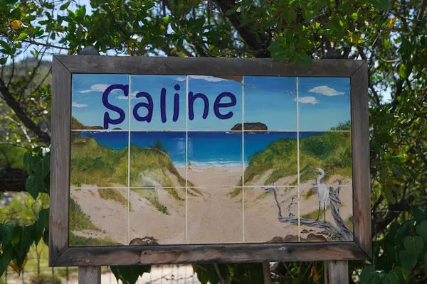 stock image ST. BARTS, FRENCH WEST INDIES - APRIL 17, 2024: Saline Beach sign in St Barthelemy, French West Indies