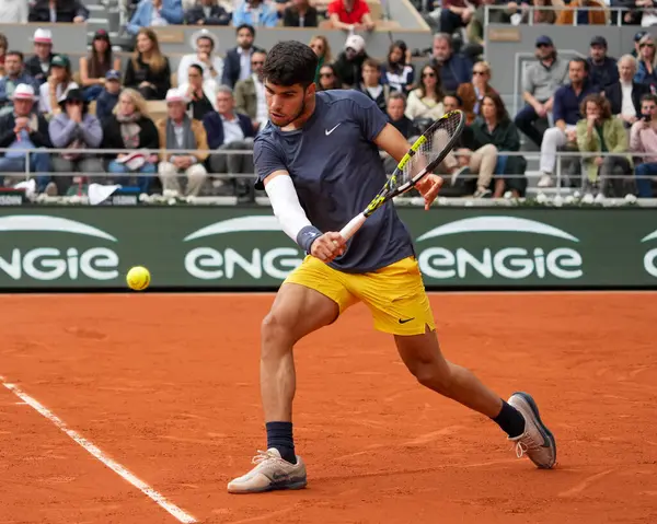 stock image PARIS, FRANCE - JUNE 2, 2024: Grand Slam champion Carlos Alcaraz of Spain in action during 2024 Roland Garros men's round 4 match against Felix Auger Aliassime of Canada at Court Philippe Chatrier in Paris, France