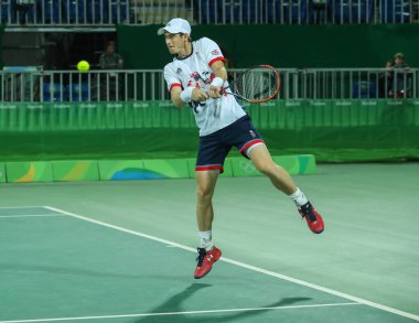 Rio De Janeiro, Brezilya - 12 Ağustos 2016: Olimpiyat Şampiyonu Andy Murray Büyük Britanya'nın işlemi Rio 2016 Olimpiyat Oyunları, Olympic Tennis Centre'erkekler tekler çeyrek final sırasında