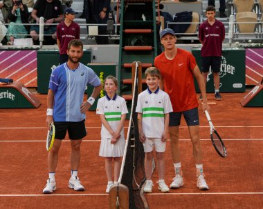 PARIS, FRANCE - JUNE 2, 2024: Corentin Moutet of France (L) and Grand Slam champion Jannik Sinner of Italy by the net before 2024 Roland Garros men's fourth round match in Paris, France clipart