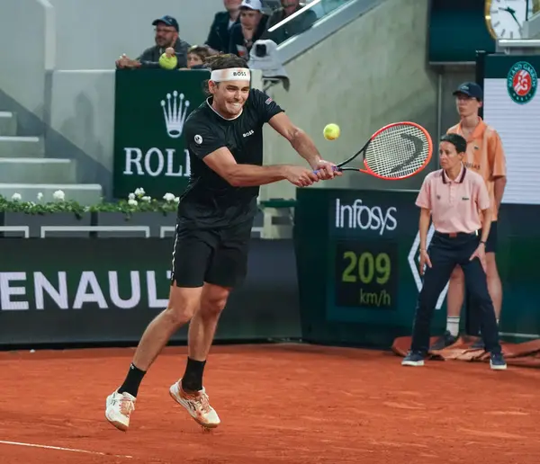 stock image PARIS, FRANCE - JUNE 3, 2024: Professional tennis player Taylor Fritz of United States in action during his 2024 Roland Garros men's fourth round match against Casper Ruud of Norway in Paris, France