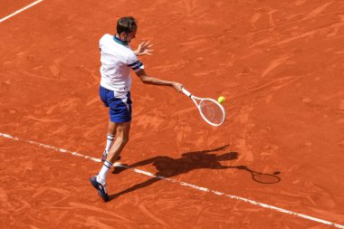 PARIS, FRANCE - JUNE 3, 2024: Grand Slam champion Daniil Medvedev of Russia in action during 2024 Roland Garros men's fourth round match against Alex de Minaur of Australia in Paris, France clipart