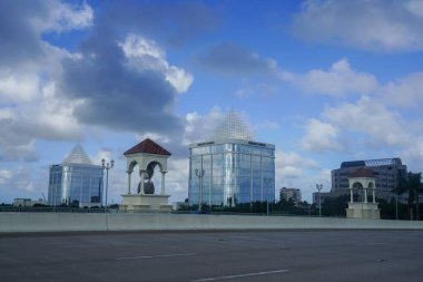 PALM BEACH GARDENS, FLORIDA - OCTOBER 27, 2020: PGA Flyover Bridge and Divosta Towers in Palm Beach Gardens, Florida.  clipart