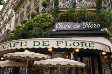 PARIS, FRANCE - JUNE 2, 2024: A view of the famous Cafe de Flore in Saint-Germain-des-Pres in Paris, France clipart