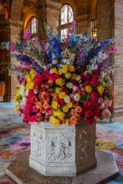 Festive floral welcome guests at The Breakers Palm Beach in Florida. The Breakers Palm Beach is a historic, 538 room, Italian Renaissance-style hotel  clipart