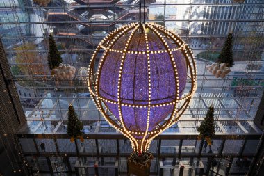 NEW YORK - NOVEMBER 28, 2023: The Hudson Yards shopping mall decorated for Holidays Season in New York clipart