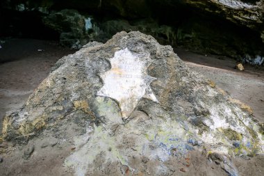 ELEUTHERA, THE BAHAMAS - JUNE 11, 2019: Preacher's Cave Pulpit with Placard in Eleuthera, Bahamas. It says 