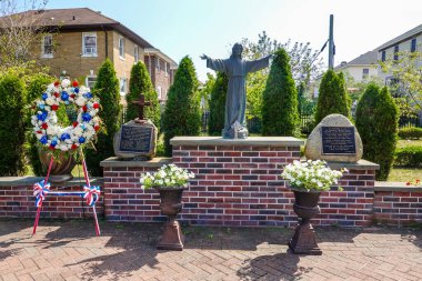 FAR ROCKAWAY, NEW YORK - SEPTEMBER 15, 2024: St. Francis de Sales has honored the parish members who died in 2001 in the attack on the World Trade Center and in the crash of American Airlines Flight 587 in Belle Harbor clipart