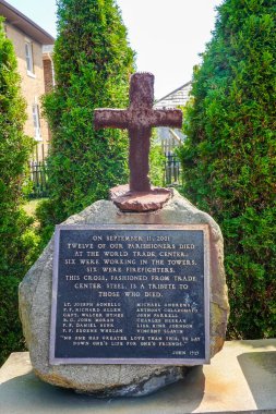 FAR ROCKAWAY, NEW YORK - SEPTEMBER 15, 2024: St. Francis de Sales has honored the parish members who died in 2001 in the attack on the World Trade Center and in the crash of American Airlines Flight 587 in Belle Harbor clipart