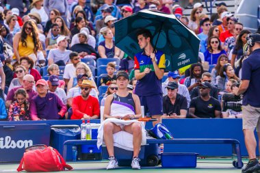 NEW YORK - AUGUST 26, 2019: Professional tennis player Elina Svitolina of Ukraine in action during her 2019 US Open first round match at the Billie Jean King National Tennis Center in New York clipart