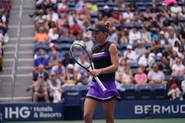 NEW YORK - AUGUST 29, 2019: Grand Slam Champion Simona Halep of Romania in action during her 2019 US Open second round match at Billie Jean King National Tennis Center in New York  clipart