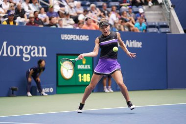 NEW YORK - AUGUST 29, 2019: Grand Slam Champion Simona Halep of Romania in action during her 2019 US Open second round match at Billie Jean King National Tennis Center in New York  clipart