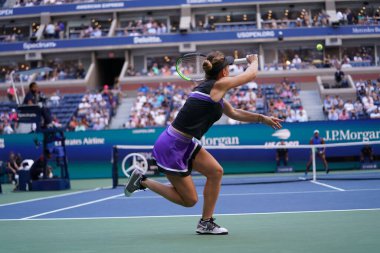 NEW YORK - AUGUST 29, 2019: Grand Slam Champion Simona Halep of Romania in action during her 2019 US Open second round match at Billie Jean King National Tennis Center in New York  clipart