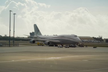 WEST PALM BEACH, FLORIDA - FEBRUARY 16, 2025: Boeing 747 formerly owned by Qatar's royal family on tarmac at Palm Beach International Airport. US President Donald Trump toured plane on February 15, 2025. clipart