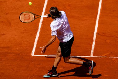 PARIS, FRANCE - MAY 30, 2022: Professional tennis player Stefanos Tsitsipas of Greece in action during his round 4 match against Holger Rune of Denmark at 2022 Roland Garros in Paris, France