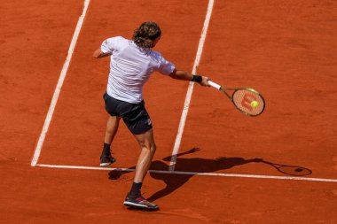 PARIS, FRANCE - MAY 30, 2022: Professional tennis player Stefanos Tsitsipas of Greece in action during his round 4 match against Holger Rune of Denmark at 2022 Roland Garros in Paris, France