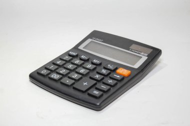 Black digital calculator isolated on the top view white background