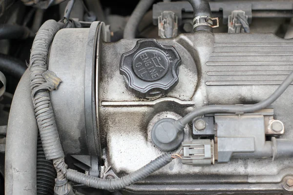 dirty engine room of an old car