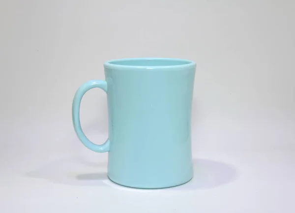 blue plastic mug isolated on white background
