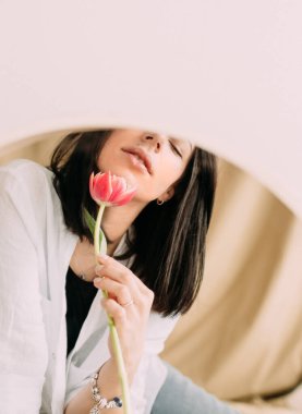 girl with tulip flower in mirror reflection romantic womens da