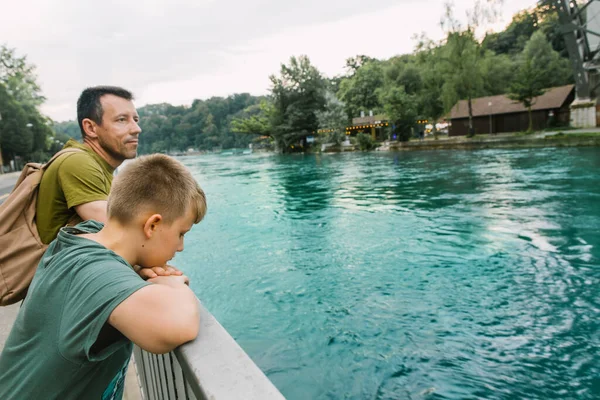 Dad Son Look Turquoise River Switzerland Cit — Stock fotografie