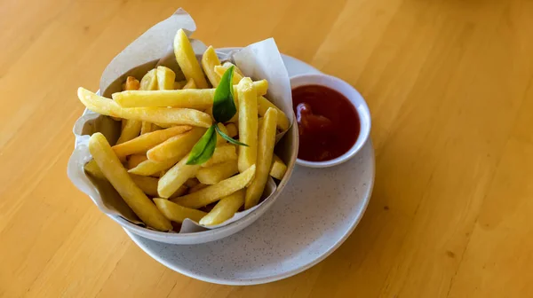 french-fries-or-potato-chips-fried-french-fries-on-a-basket-on-the